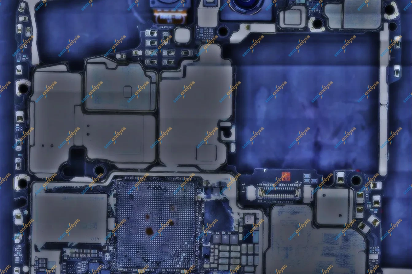 Blue-tinted view of a phone logic board, two camera modules at the top and shielded blocks of components below