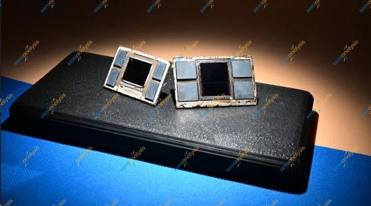 Two opened processor packages resting on a black tray under warm light